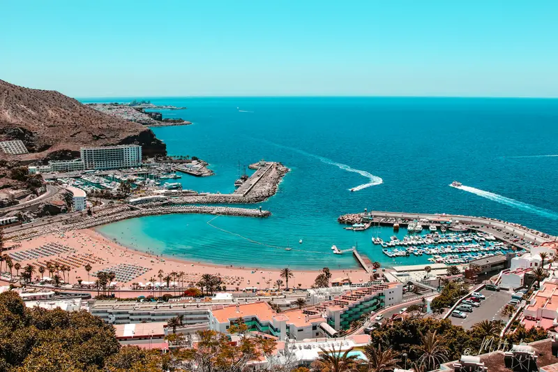 A sandy bay and marina on the south coast of Gran Canaria