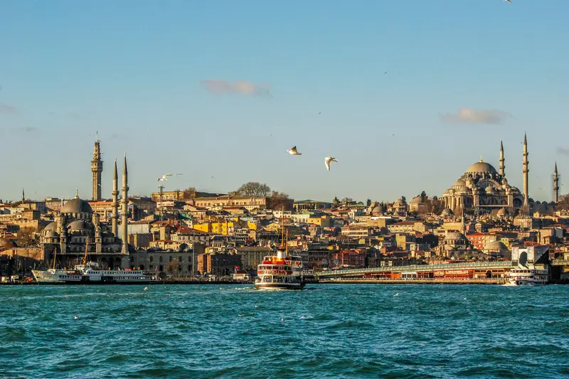 A ferry on the Bosphorus with the mosques of Istanbul behind